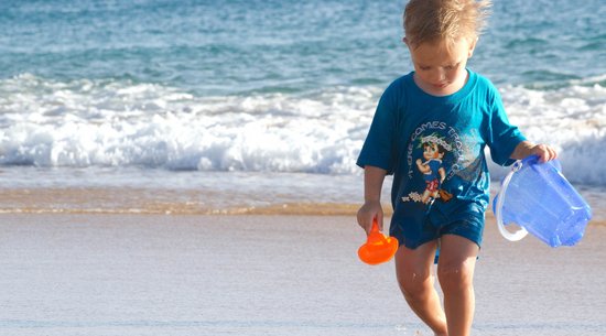 Baby Beach in Lahaina with calm waves and coral